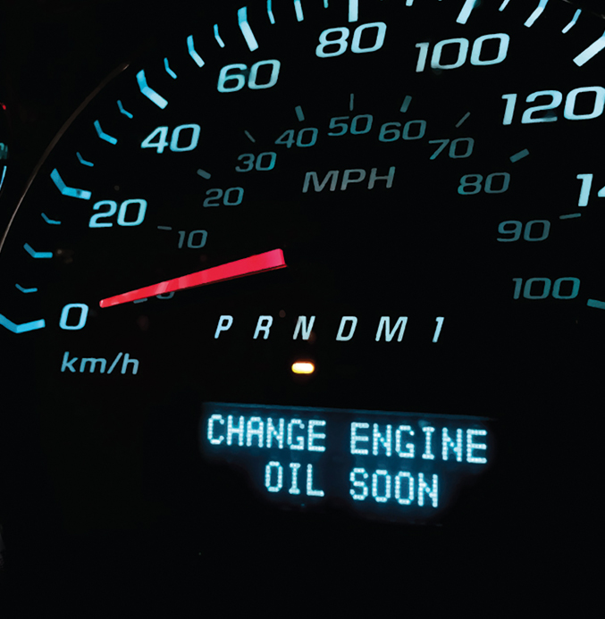 Engine Oil Change Warning on Commercial Vehicle Dashboard Dashboard warning displaying "Change Engine Oil Soon" on a commercial vehicle instrument cluster.
