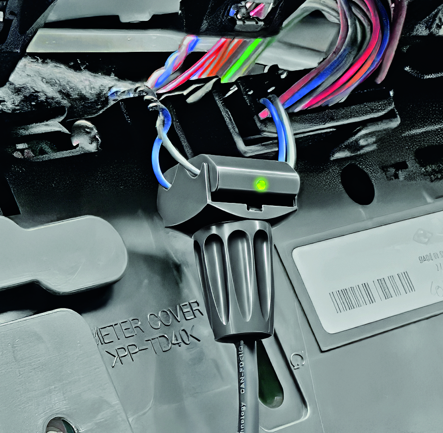 IAA DEF CANcliq NG_website Squarell CANcliQ NG installed around vehicle CAN bus wires for non-intrusive CAN data access.